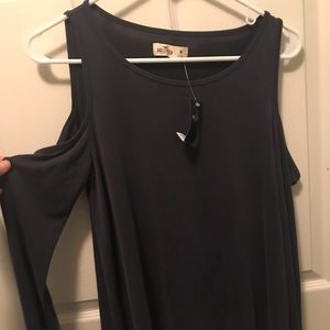 Navy blue shirt, open shoulders